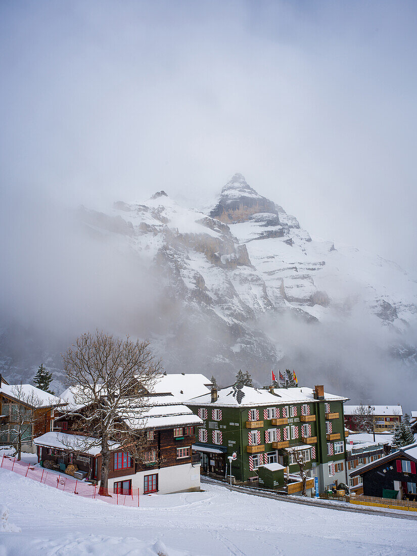  Mürren and Schwarzmönch massif in the fog, Mürren, Bernese Oberland, Lauterbrunnen, Interlaken-Oberhasli, Canton of Bern, Switzerland, Alps, Europe 