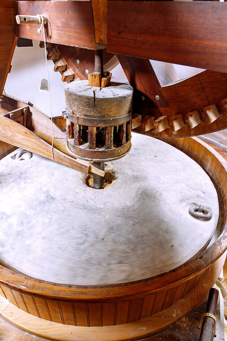  Grinding mechanism of the restored old windmill Tou Papa in Antimachia on the island of Kos in Greece 