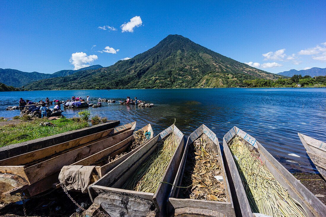 Cayucos stranded in front of the San Pedro volcano, southwest of the caldera of Lake Atitlán , Santiago Atitlán. ,Guatemala, Central America