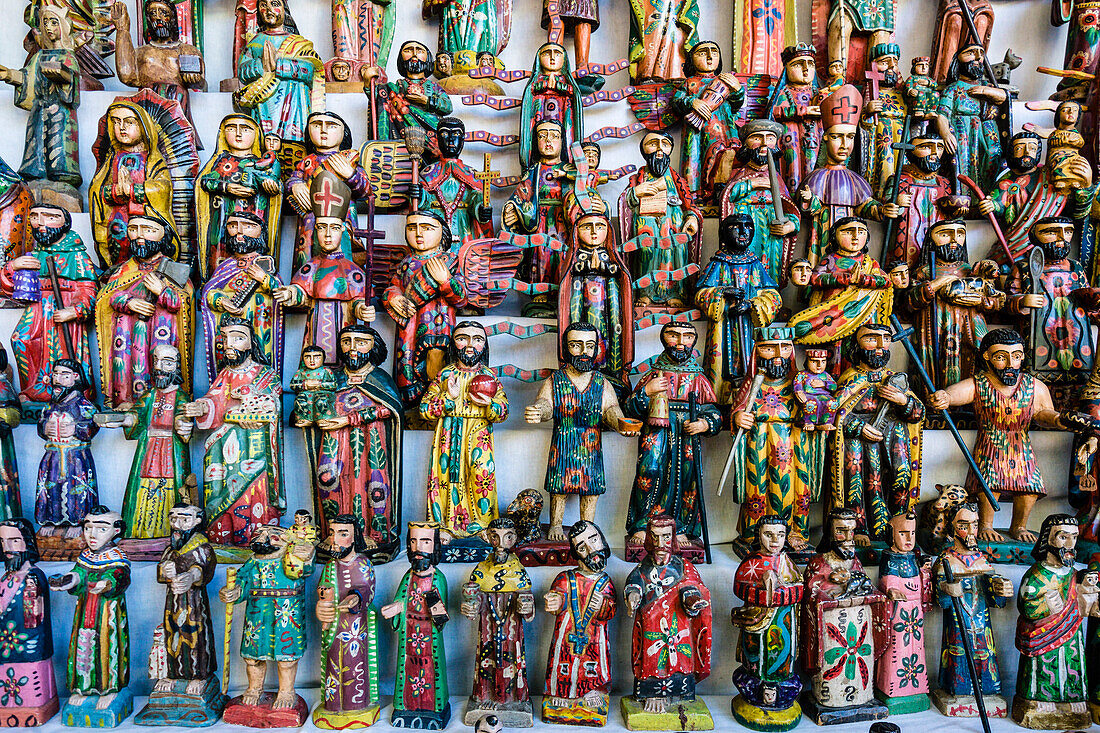 wooden figures of saints, Santiago Atitlan, market, Sololá department, Guatemala, Central America