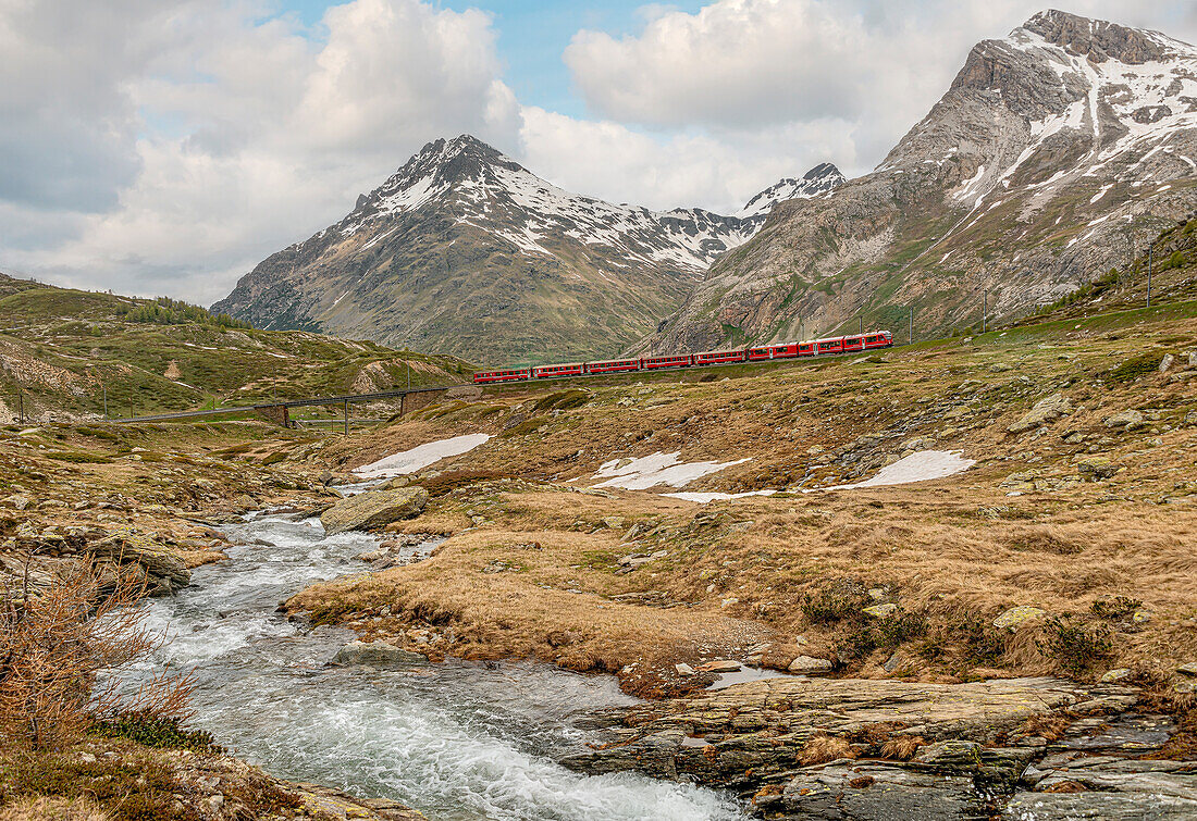  Mountain railway at Lago Bianco, Bernina Pass, Graubünden, Switzerland in summer 