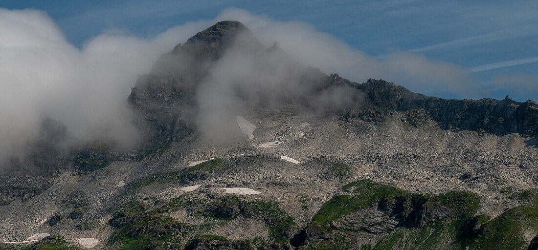  Medelzkopf (2 761 m) under light clouds, Hohe Tauern National Park, Salzburg-Tyrol border, Austria 