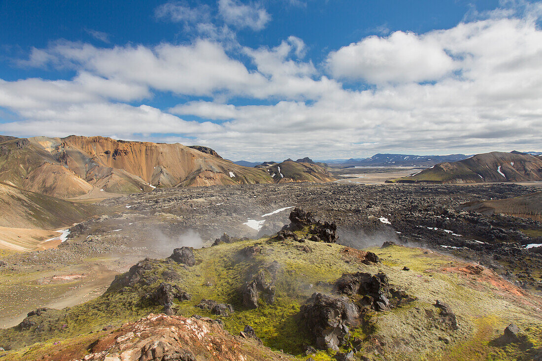  Colourful rhyolite mountains with snow remnants at Brennisteinsalda volcano in Landmannalaugar, Fjallabak National Park, Sudurland, Iceland 