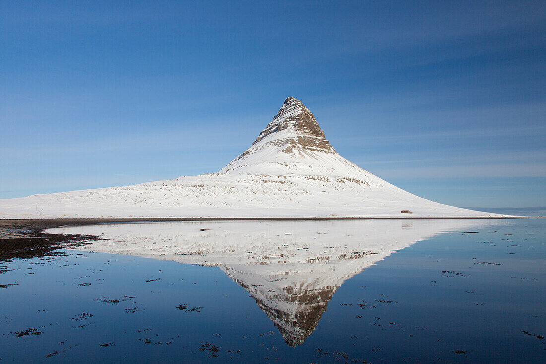  Kirkjufjell mountain reflected in the fjord, winter, Iceland 