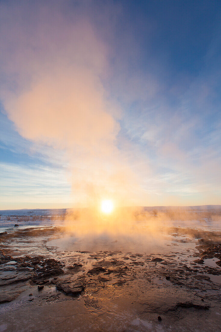  Strokkur Geysir (Butter Churn Geysir) in the Haukadalur hot spring valley erupting, winter, Iceland 