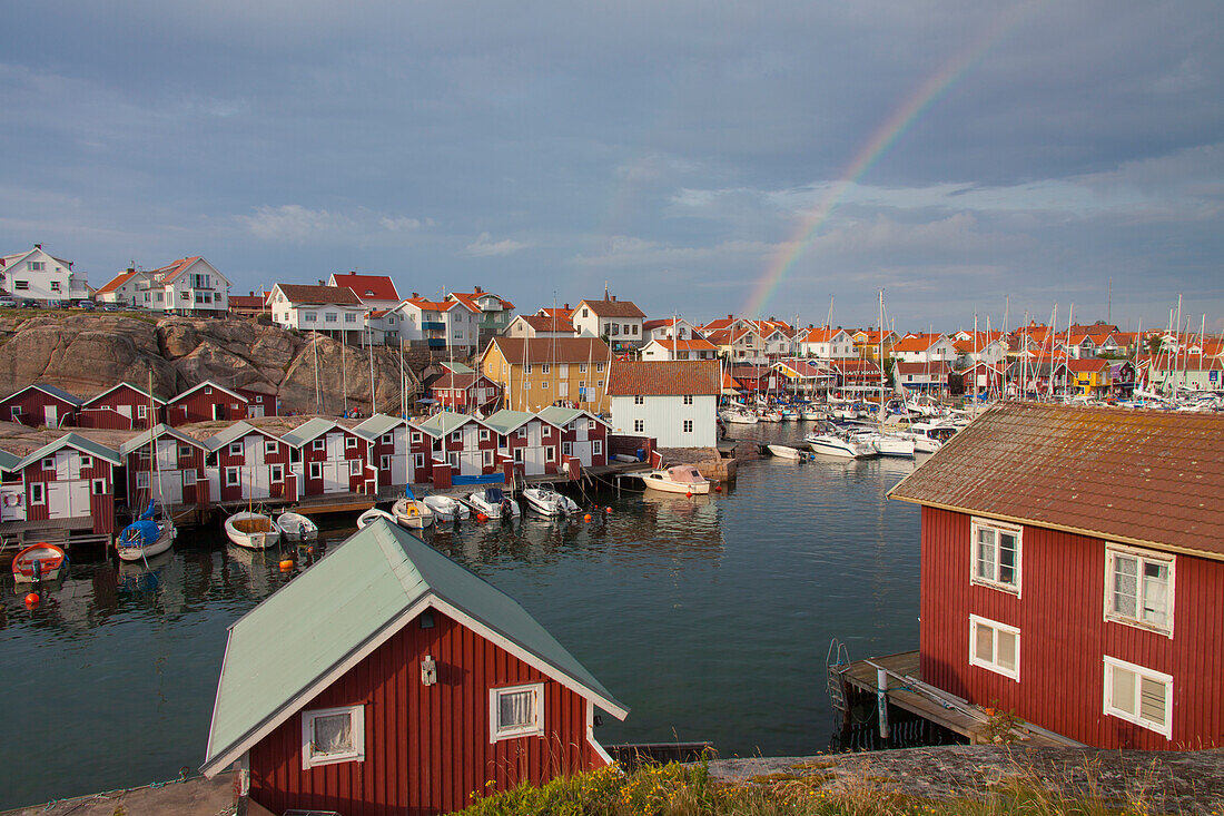  Colorful boathouses in Smoegen, archipelago, Bohuslaen, Sweden 