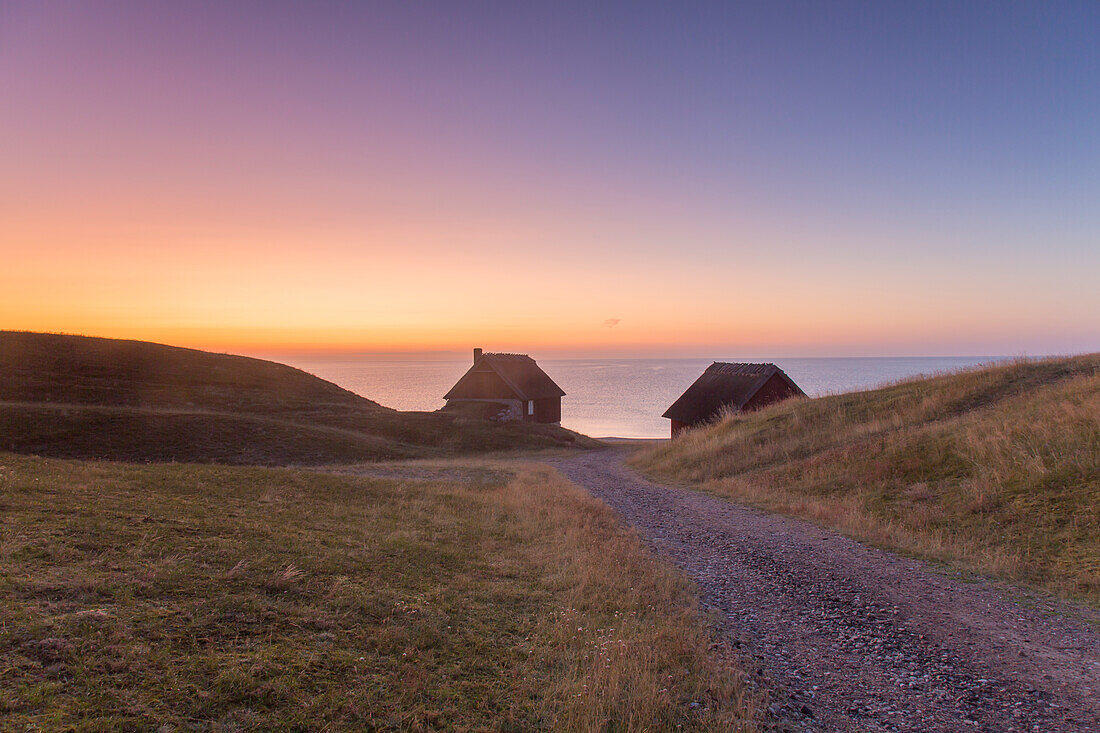  Fisherman&#39;s hut on the coast at sunrise, Havaeng, Skåne County, Sweden 