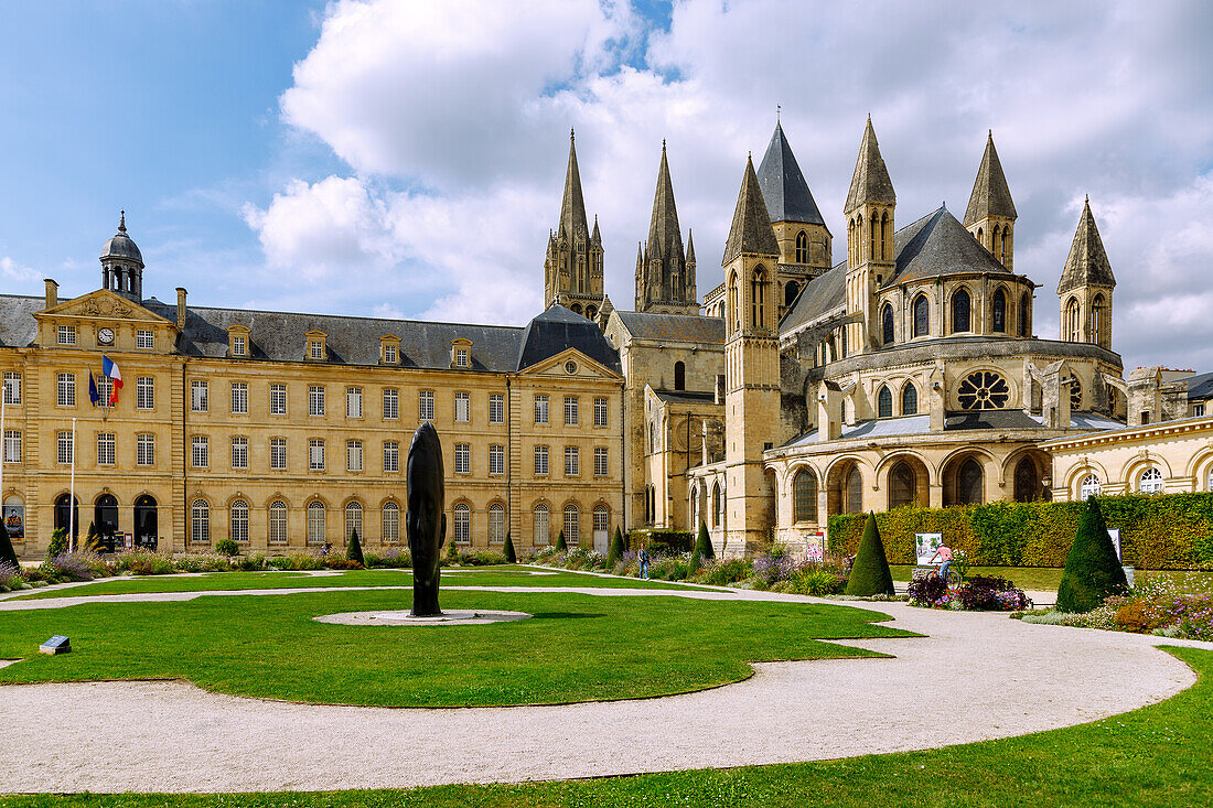  Abbaye aux Hommes (Men&#39;s Abbey, Hôtel de Ville, Town Hall) and Church of Saint-Ètienne (Saint-Etienne) with garden and sculpture &quot;Lou&quot; by Jaume Plensa (2015) in Caen in the Calvados department in the Normandy region of France 