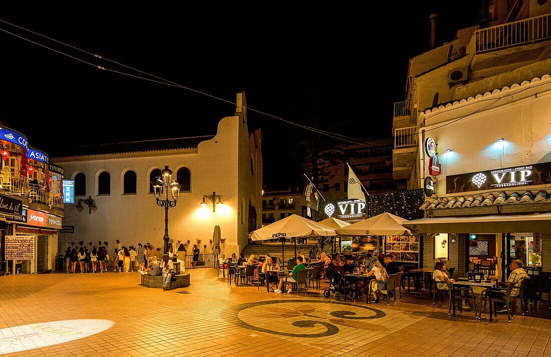  Evening atmosphere in the old town of Torremolinos, San Miguel church in the background, Costa del Sol, Spain 