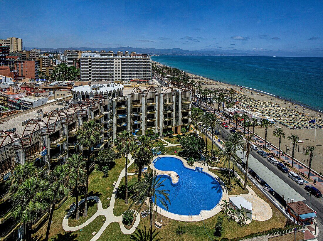  View from the Meliá Costa del Sol hotel to the hotel pool and the hotel and apartment complexes on El Bajondillo beach, Malaga Bay in the background, Torremolinos, Costa del Sol, Spain 