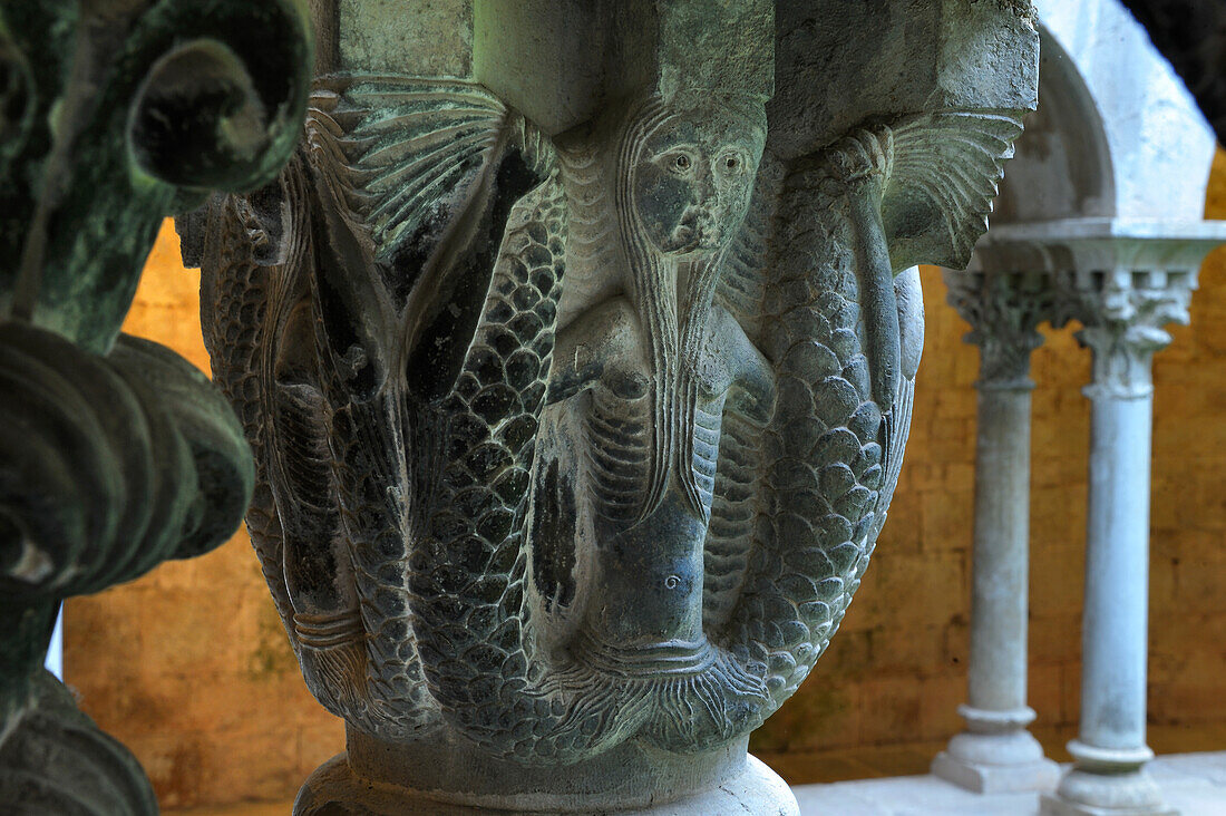 detail of a capital in the cloister, depicting a siren with two tails, at Sant Pere de Galligants monastery housing the Archaeological Museum of Catalonia, Girona, Catalonia, Spain,Europe