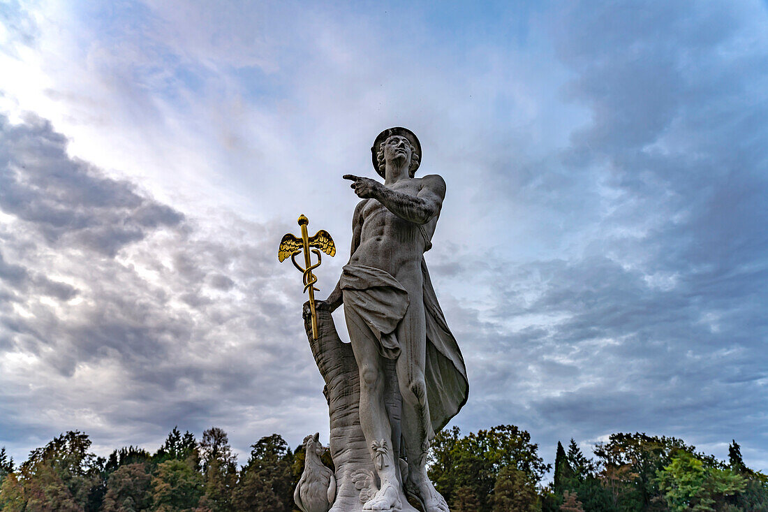  Statue of Hermes or Mercurius in the park of Nymphenburg Palace in Munich, Bavaria, Germany  