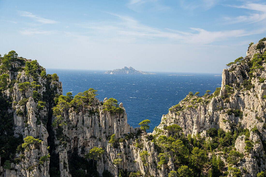  View between rocks to Ile Riou in the Calanques National Park between Cassis and Marseille, Provence, France, Europe 