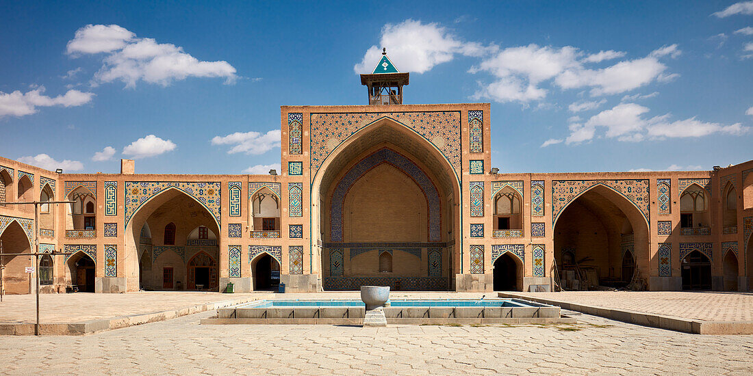 Panoramic courtyard view of the 17th century Hakim Mosque in the historic center of Isfahan, Iran.