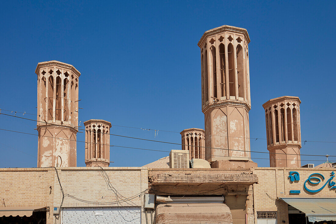 The windcatchers - traditional towers for cross ventilation and passive cooling of buildings. Yazd, Iran.