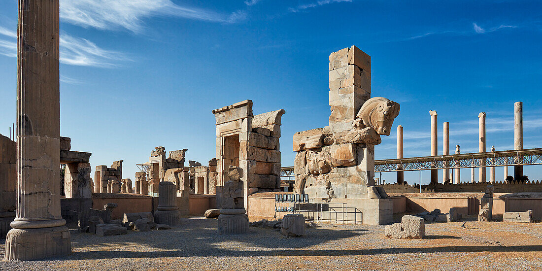 Huge stone bull at the Northwestern gate of the Hundred Column Hall in Persepolis, ceremonial capital of the Achaemenid Empire (550–330 BC), Iran.