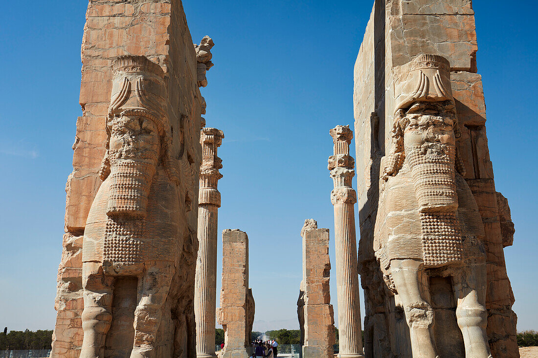 Human-headed winged bulls (Lamassu, protective deity) on the Gate of All Nations in Persepolis, capital of the Achaemenid Empire (550–330 BC), Iran.