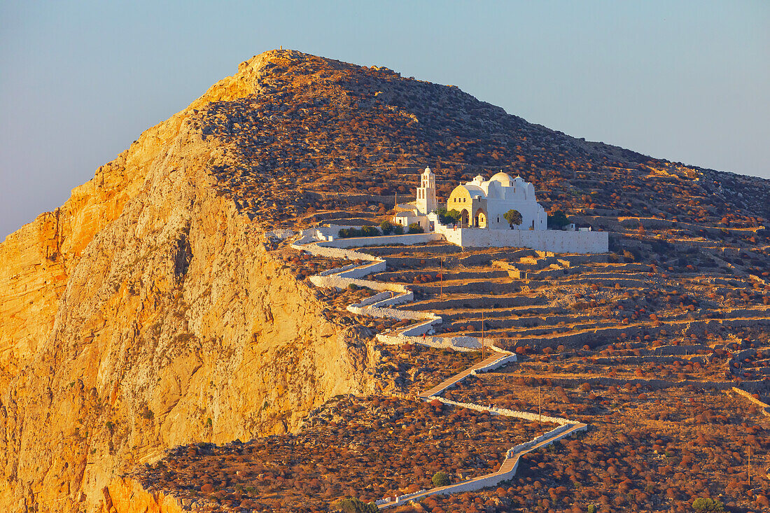 View of Panagia Kimissis church built on a cliff above the sea, Chora, Folegandros Island, Cyclades Islands, Greece