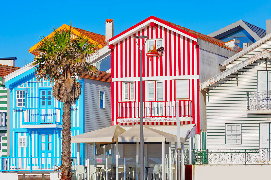 Brightly painted beach homes, Costa Nova do Prado, Aveiro, Portugal