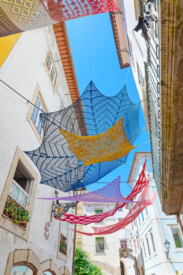 Old town street decorated with Portuguese artefacts, Coimbra, Coimbra district, Centro Region, Portugal