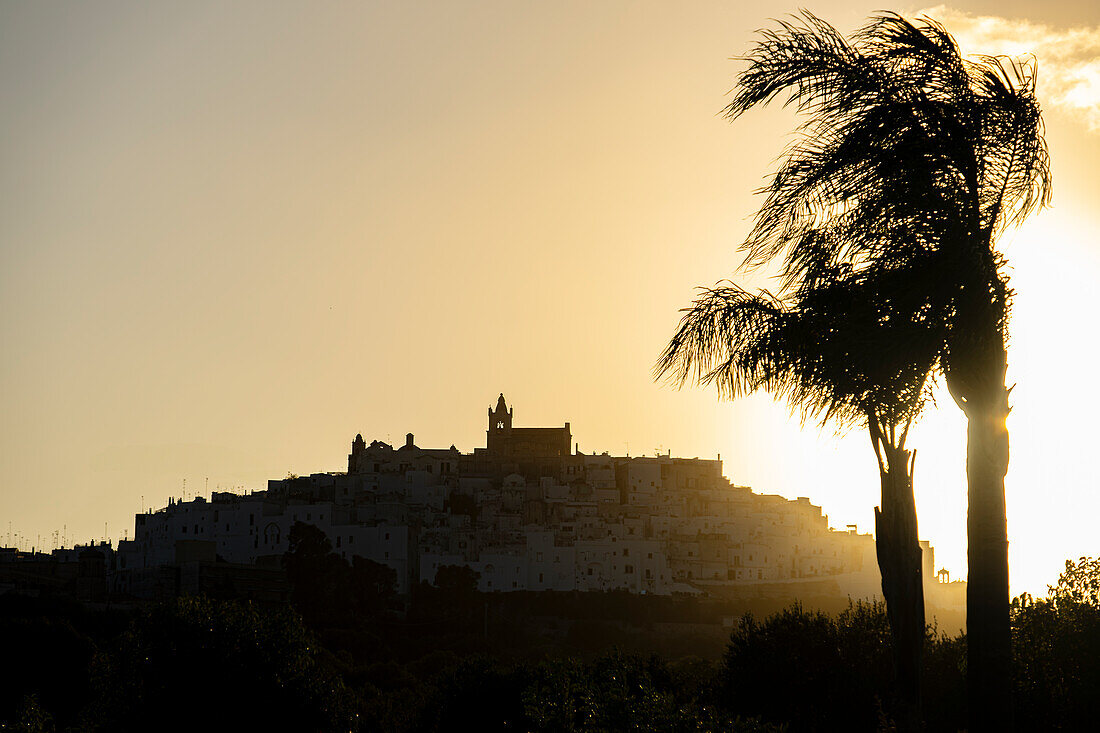 Beautiful sunset view on the old town Ostuni, Puglia, Italy.