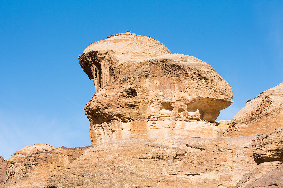 Sandstone rock at the entrance of the Siq, narrow gorge leading to the Historic and archaeological Nabataean city of Petra, UNESCO World Heritage Site, Jordan, Near East, Southern Levant, West Asia