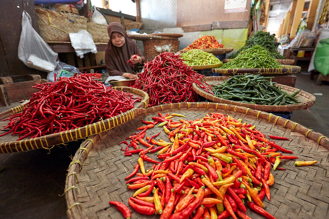 A selection of chili peppers displayed for sale at Beringharjo Market (Pasar Beringharjo). Yogyakarta, Java, Indonesia.