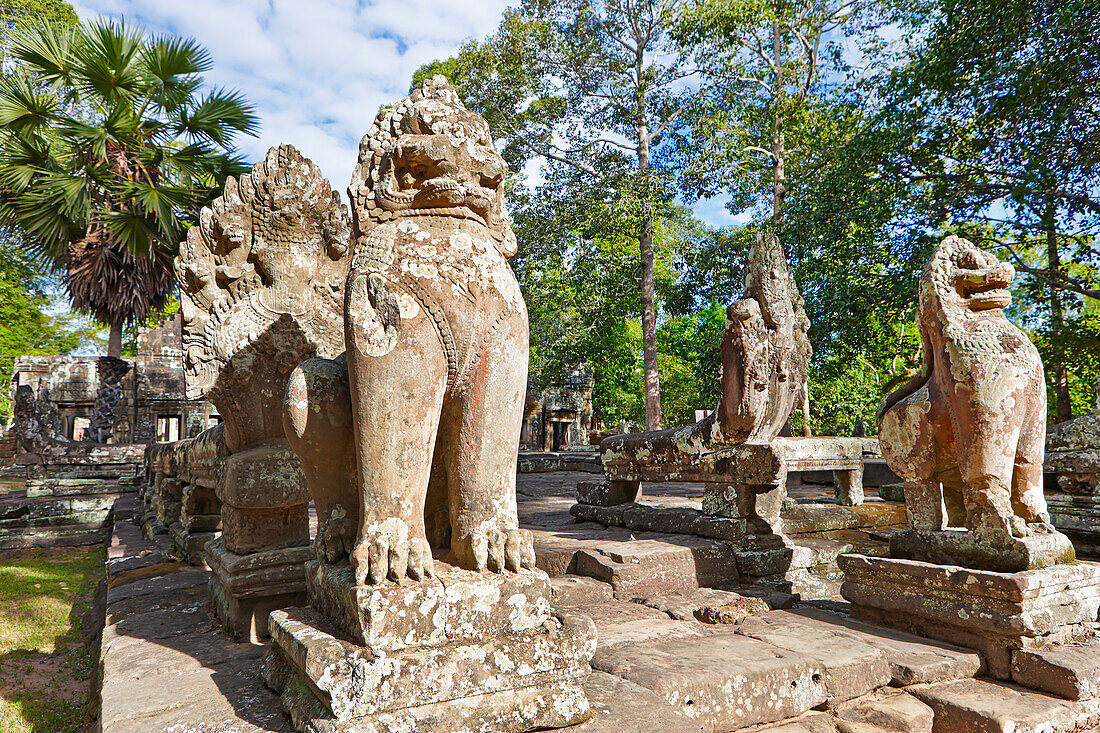 Stone statues at the ancient Banteay Kdei temple. Angkor Archaeological Park, Siem Reap Province, Cambodia.