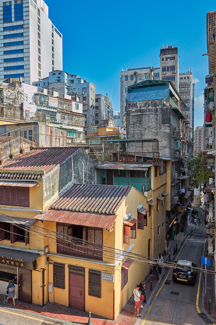 Elevated view of old buildings in the historic centre of Macau city, China.