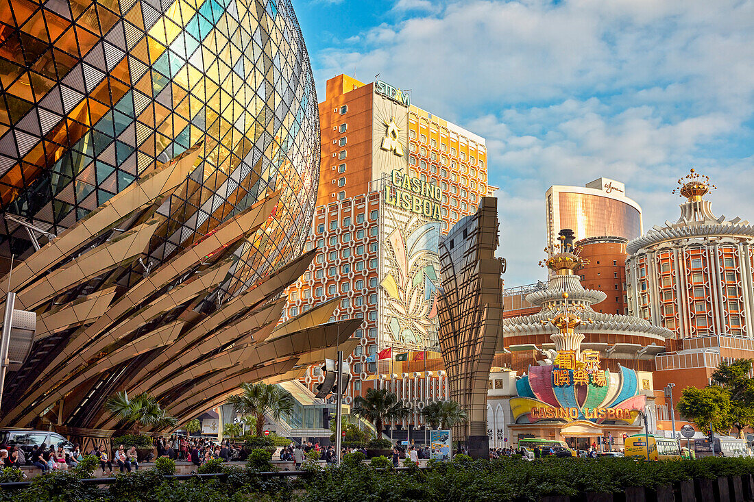 Exterior view of the buildings of two nearby casino hotels – The Grand Lisboa Hotel (left) and The Lisboa Hotel (right). Macau, China.