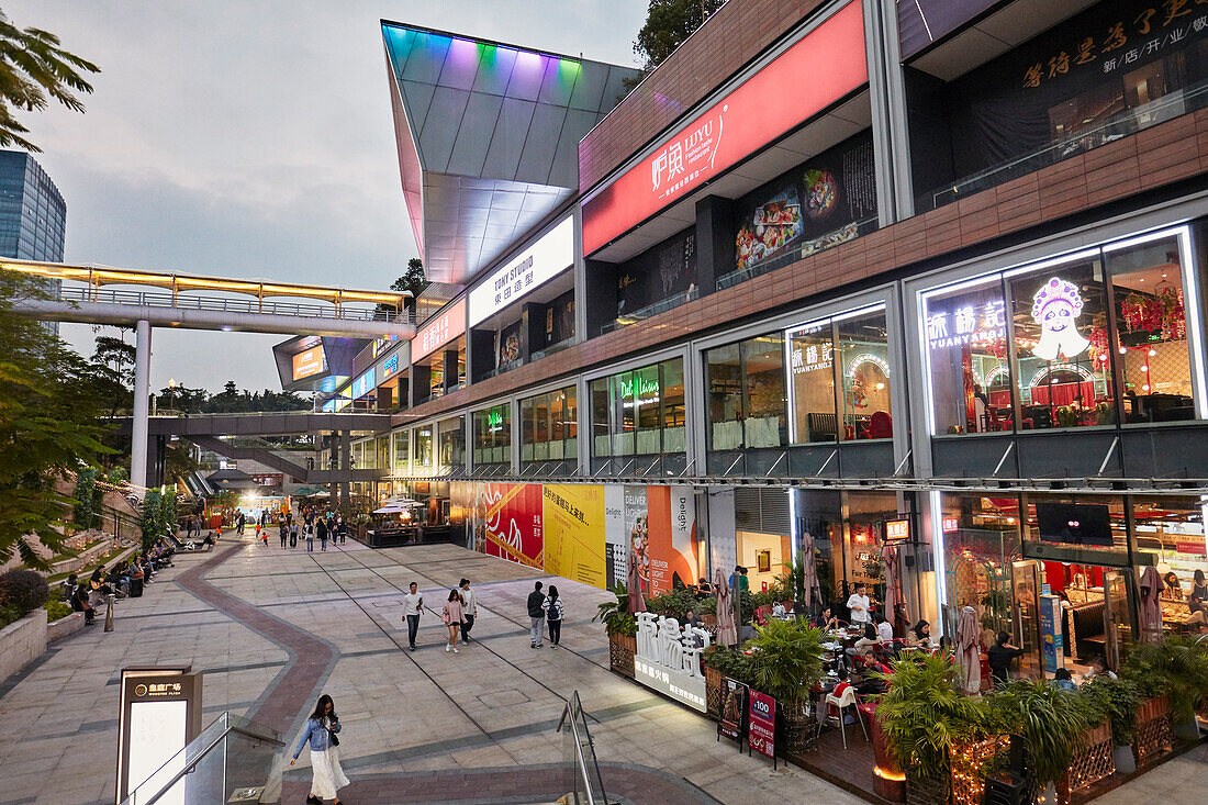 Wongtee Plaza shopping mall illuminated at dusk. Shenzhen, Guangdong Province, China.