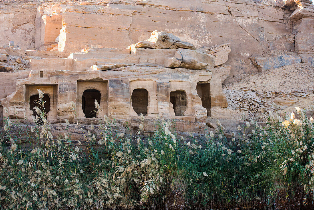 Chapels overlooking the Nile River, Archaeological site of Gebel Silsileh where is the largest sandstone quarry of ancient Egypt: Kheny, on the west bank of the Nile at the South of Edfu, Egypt, North-East Africa