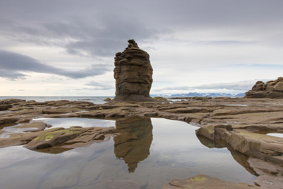  Rock needle on the coast near Boltodden, Kvalvagen, Spitsbergen, Norway 