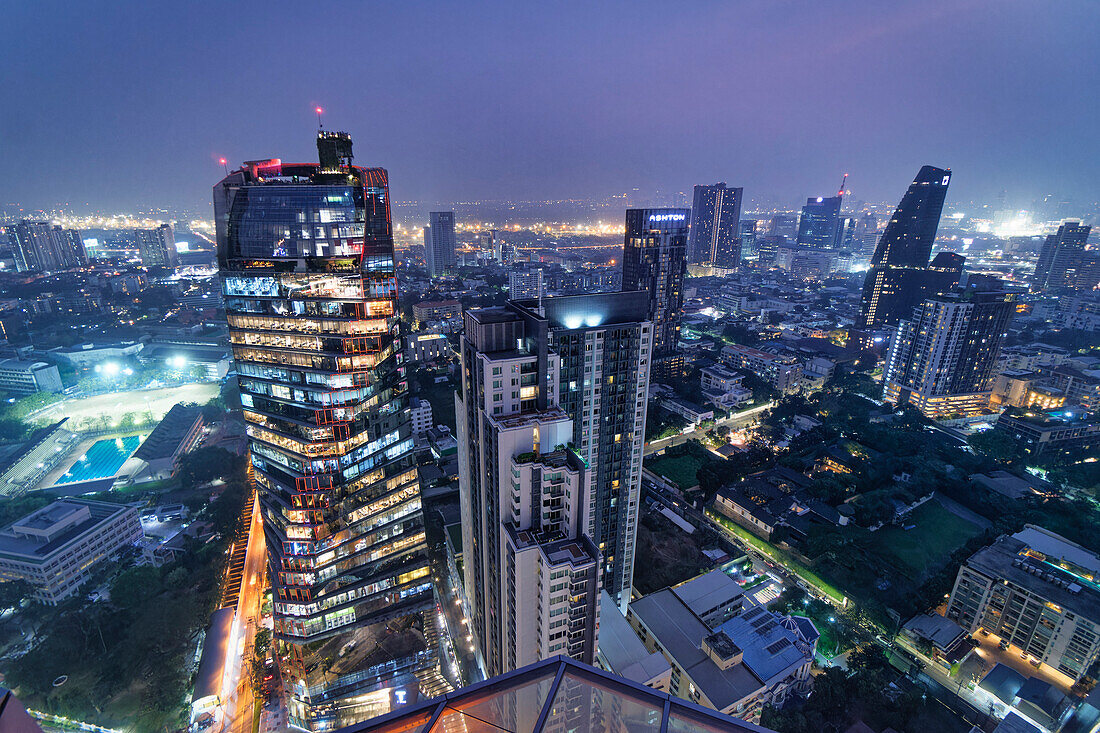  View from the Octave Rooftop Bar to the Tichuca Rooftop Bar on the 46th floor of the T‑One Building.T-One building, Top floor Tichuca Rooftop bar, Bangkok Skyline, View from Octave sky bar, Sukhumvit 40, WeWork coworking Space, Bangkok, Thailand 