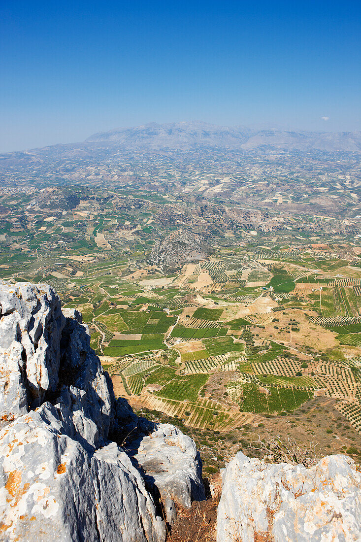 Scenic view of rural land from the Mount Juktas, aka Mount Giouchtas (Giouhtas), a mountain in north-central Crete, Greece.