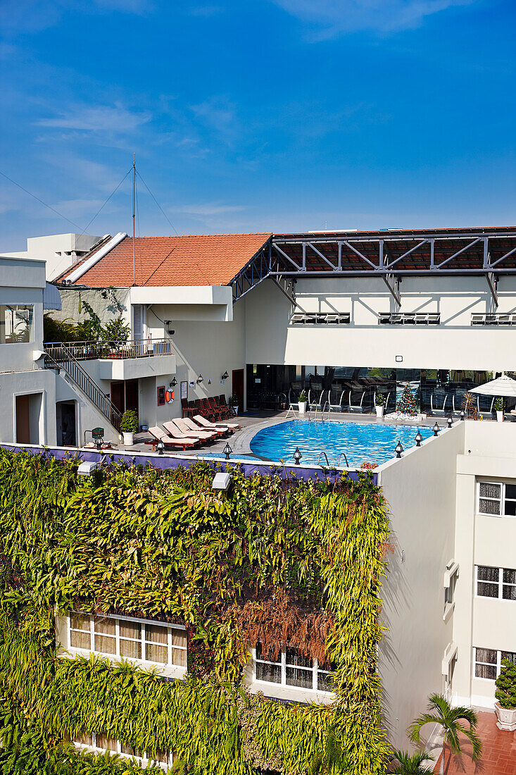 Rooftop pool area in the Rex Hotel, a famous luxury and business hotel in Ho Chi Minh City, Vietnam