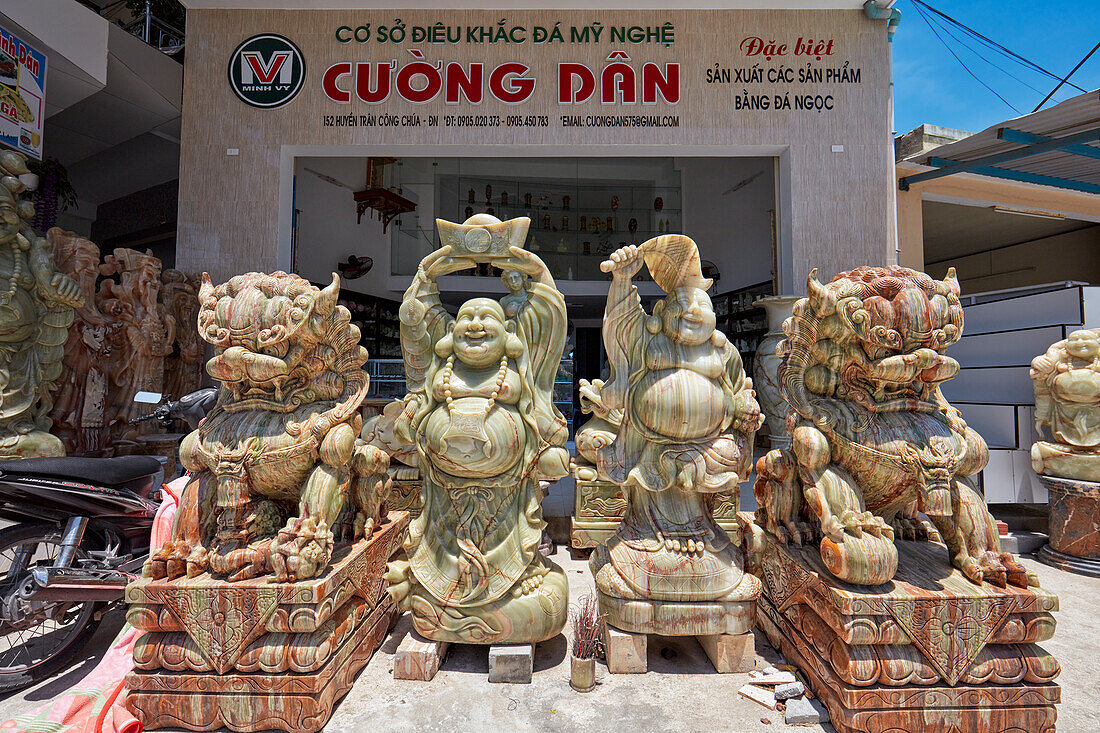 A selection of marble statues displayed for sale at shopfront. The Marble Mountains, Da Nang, Vietnam.