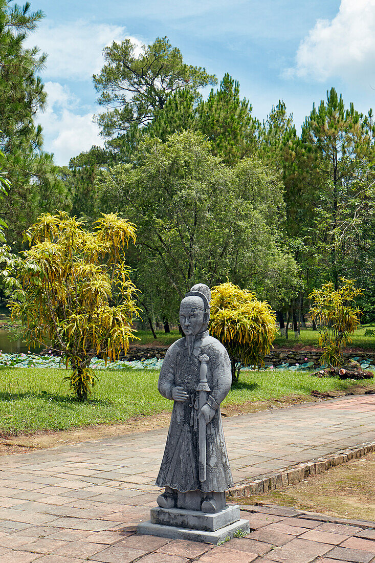 Stone figure of a Mandarin at the Tomb of Minh Mang (Hieu Tomb). Hue, Vietnam.