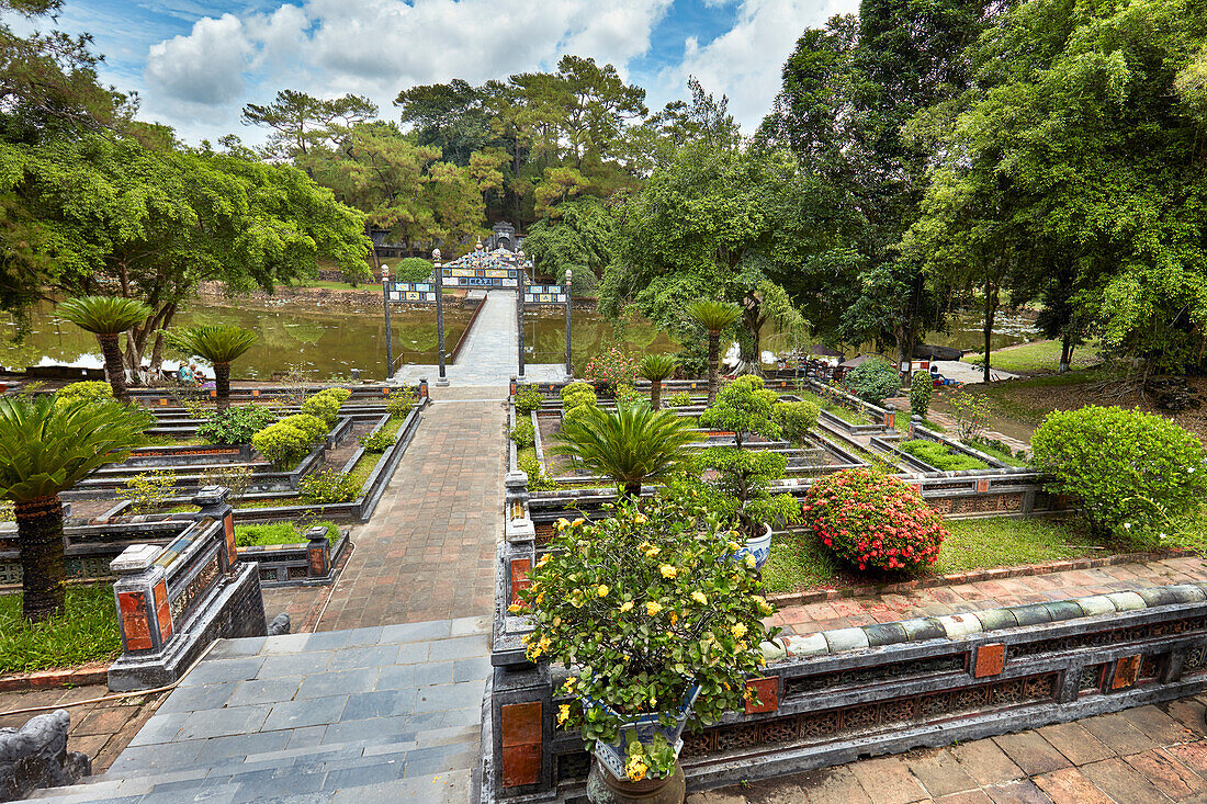 Lush landscaped garden at Tan Nguyet Lake. Tomb of Minh Mang (Hieu Tomb), Hue, Vietnam.