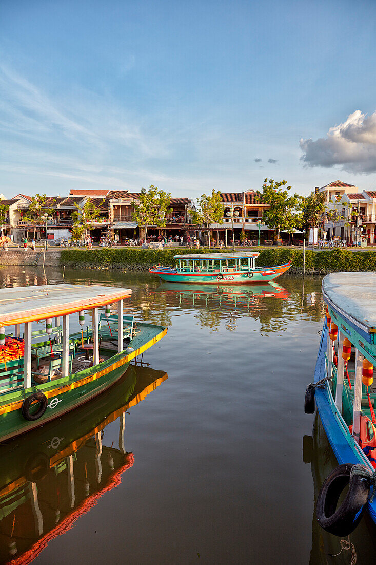 Colorful boats on the Thu Bon River in Hoi An Ancient Town. Hoi An, Quang Nam Province, Vietnam.