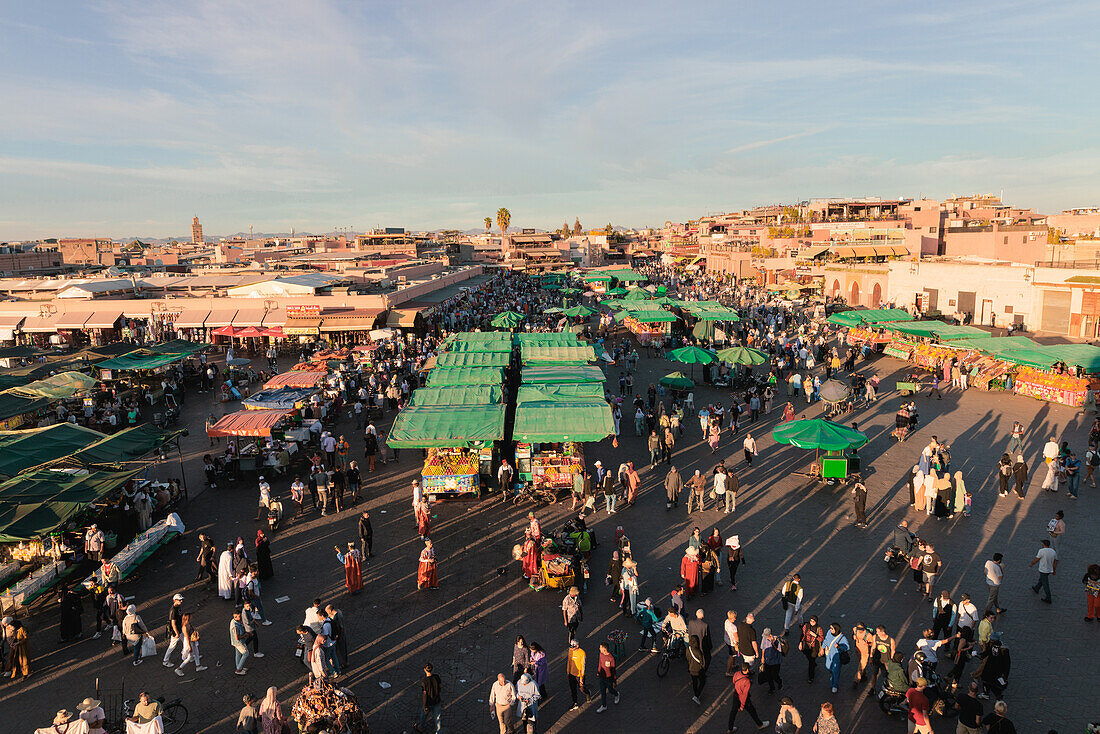  Jeema el-Fnaa in Marrakech in the old historic Medina in Morocco at sunset. 