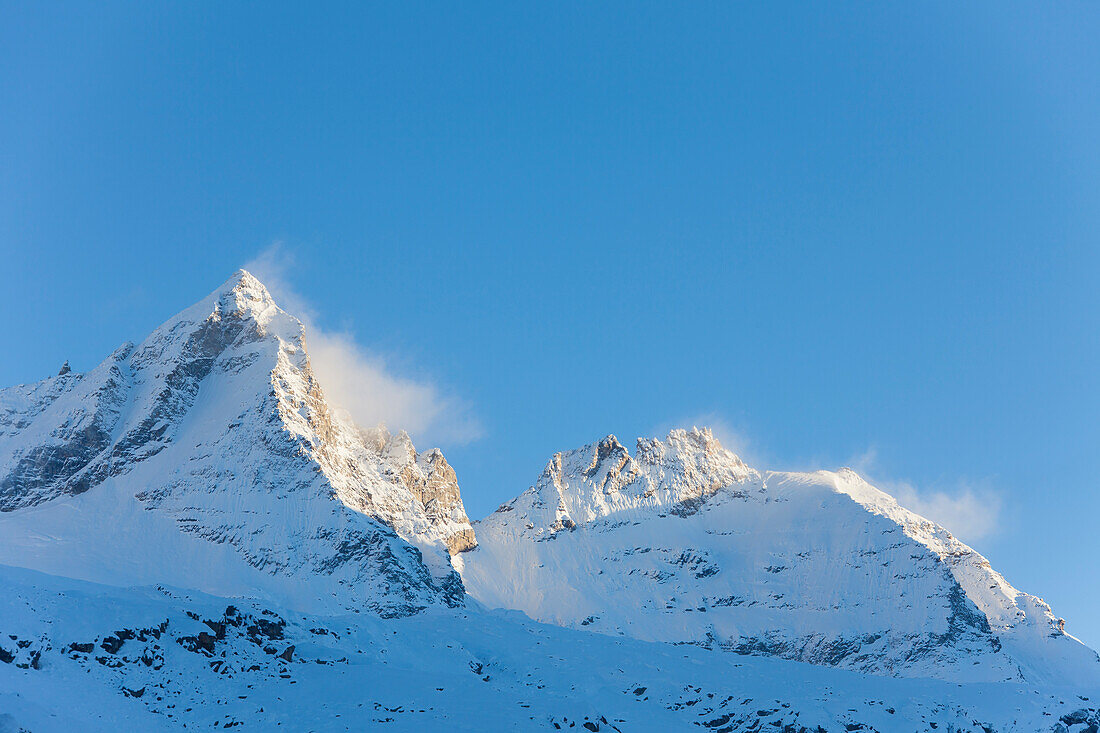  Becca di Monciair mountain in snowstorm, Gran Paradiso National Park, Aosta Valley, Italy 