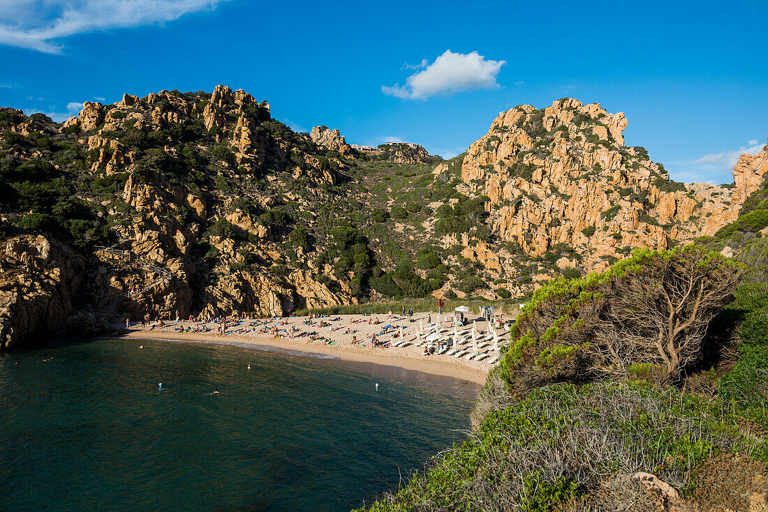  Red rocks and picturesque beach, Spiaggia di Cala li Cossi, Costa Paradiso, Sardinia, Italy 