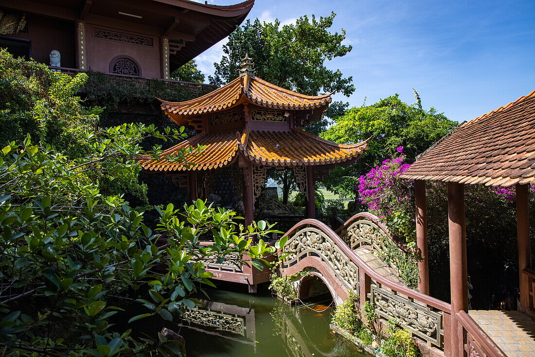  Bridge over pond at the temples of Nui Sam on Mount Sam, Nui Sam, Chau Doc, An Giang, Vietnam, Asia 