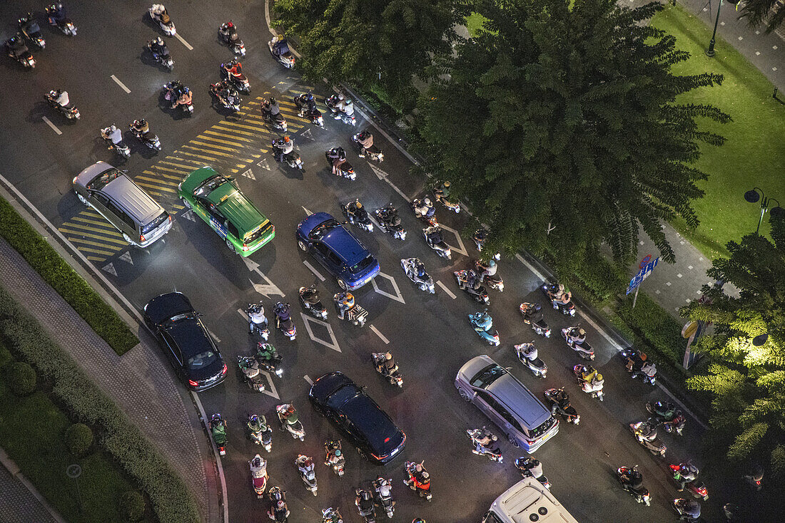  View of rush hour traffic from the Liquid Sky Bar of the Renaissance Riverside Hotel Saigon at night, Ho Chi Minh City, Vietnam, Asia 