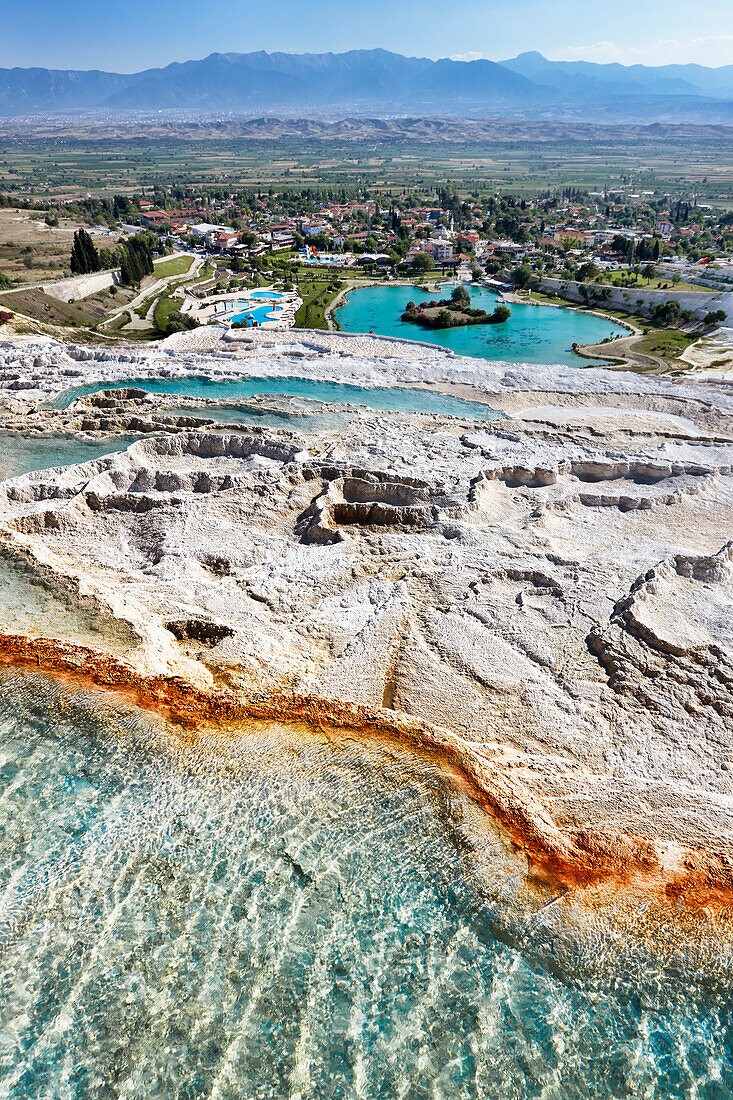 Scenic view from the upper level of travertine terraces of Pamukkale. Denizli Province, Turkey.