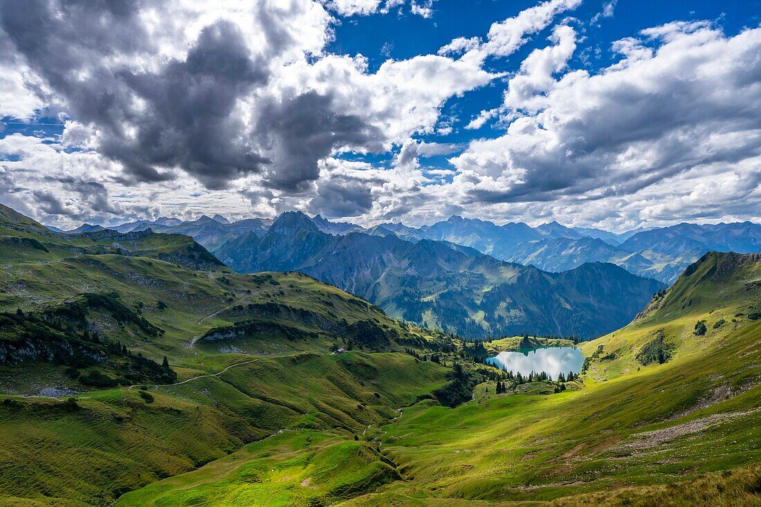  Hiking trail to the mountain lake at Nebelhorn with mountain panorama, summit panorama, panoramic trail, mountain landscape, Alps, Oberallgäu, Bavaria, Germany\n 