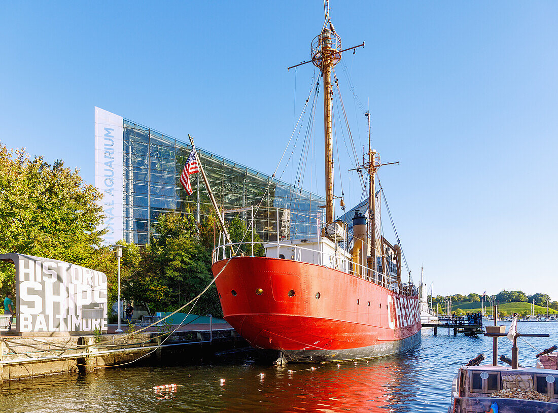  Historic Ships with light ship Cheasepeake and National Aquarium in the Inner Harbor in Baltimore, Maryland, USA 