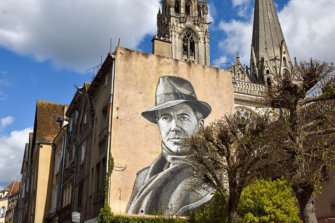 Mural with the effigy of Jean Moulin (1899-1943), hero of the French Resistance during the Second World War, who was prefect of Eure-et-Loir in Chartres, In the background the towers of the cathedrale, City of Chartres, Eure-et-Loir department, Centre-Val-de-Loire region, France, Europe