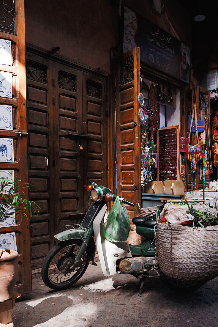  Motorbike with fresh herbs in the Medina in Marrakech, Morocco. 